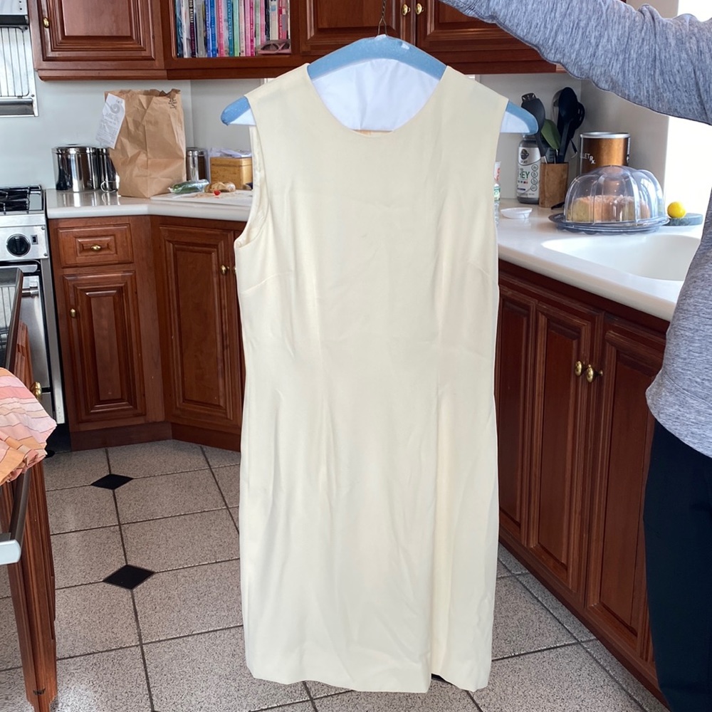 Cream below the knee dress